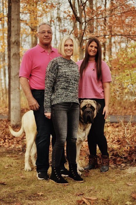 Family photo with a dog in a forest