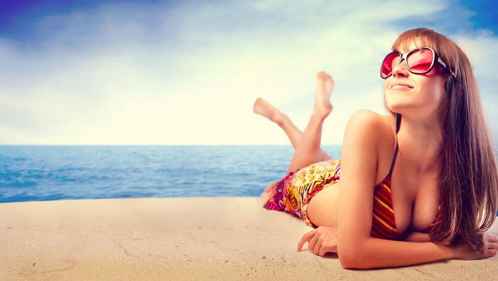 Unusual Female Model Posing On The Beach Stock Photo, Picture and Royalty  Free Image. Image 76575771.