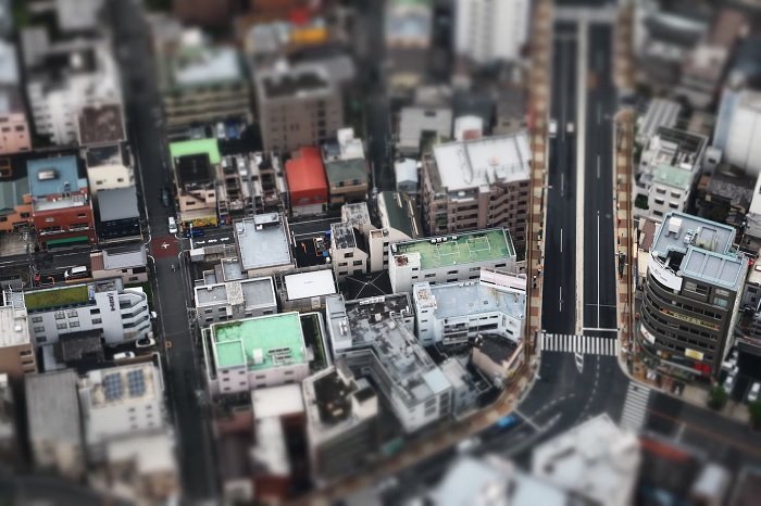 Tilt-shift photo of a city from above