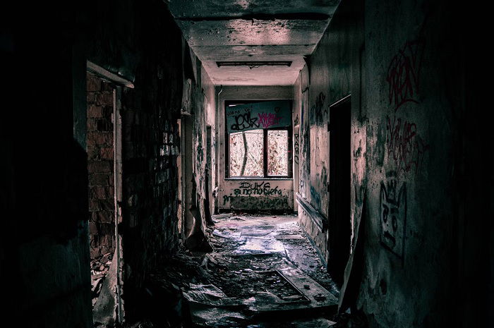 Urban exploration photography example of a corridor of derelict building