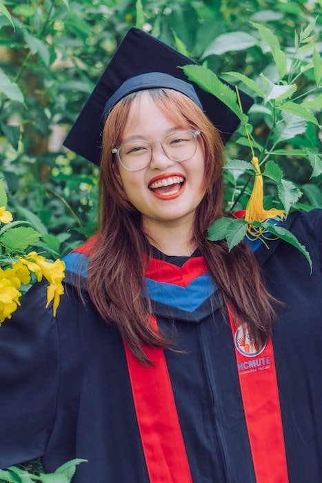 Senior high-school graduate smiling and laughing