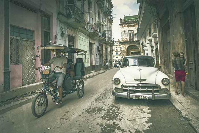 Cuba street scene with vintage color green tint