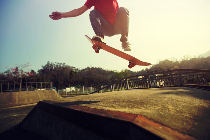 Skateboarder doing a trick in the air