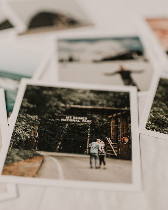 pile of photographs with holiday picture in focus 