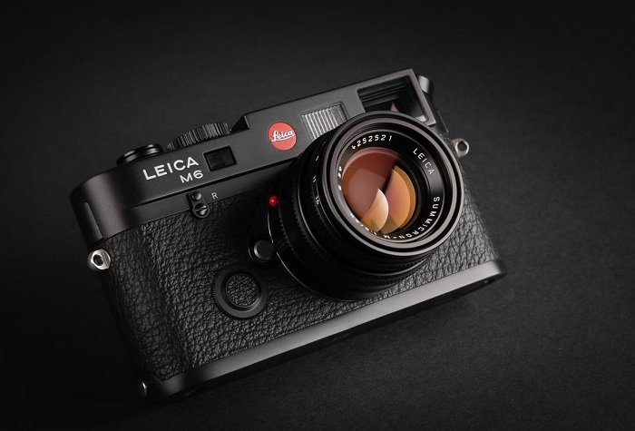 Leica camera on a black backdrop
