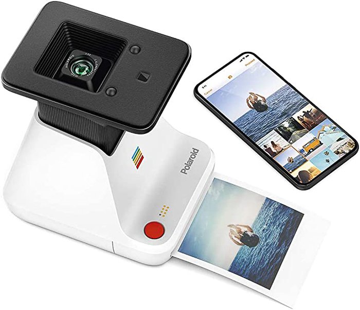 Polaroid Lab printing a photo next to a smartphone