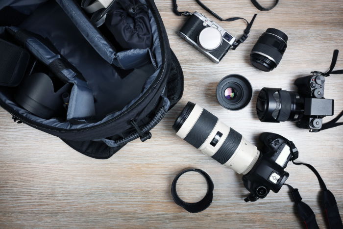 Camera equipment and bag sitting on a table