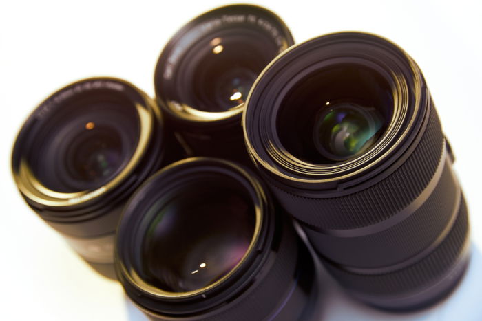 A group of lenses against a white background