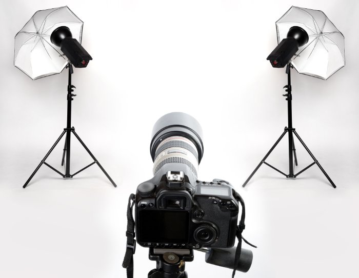 A camera and dual flash setup in a studio