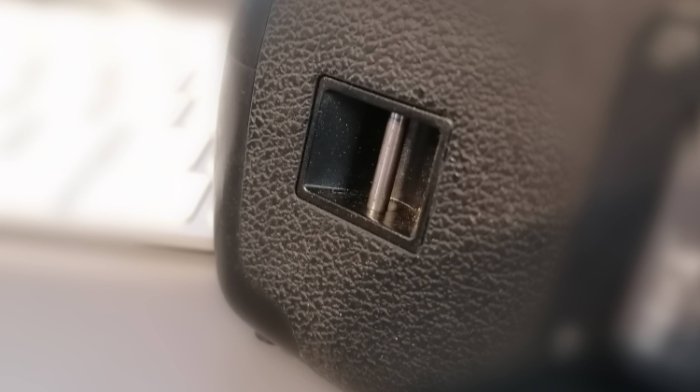 Attachment point on a Canon camera for a strap