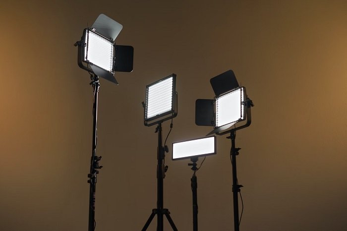 Four LED panel lights in a studio