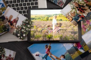 Printed pictures and a photo on a tablet