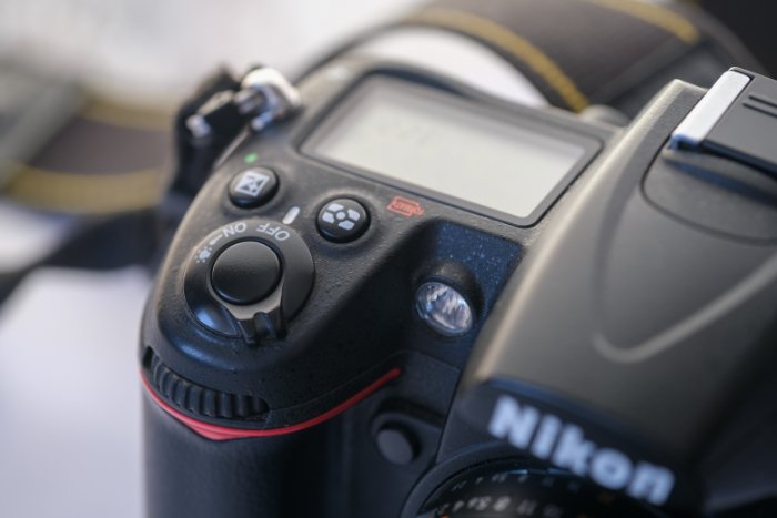 Close-up stock photo of a Nikon D7500 shutter button