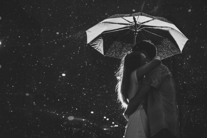 Couple under an umbrella in the rain