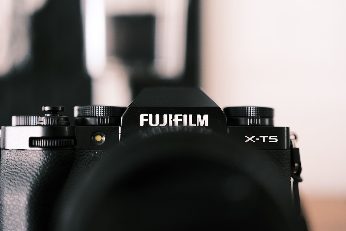 Cropped shot of the top of a Fujifilm X-T5, our choice as the best digital camera