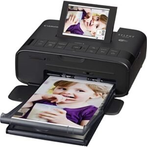 Canon Compact Photo printer printing a photo of a young girl