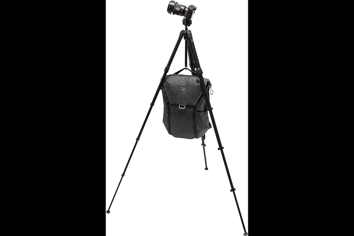 One of the best camera tripods with a camera bag hanging from the center column