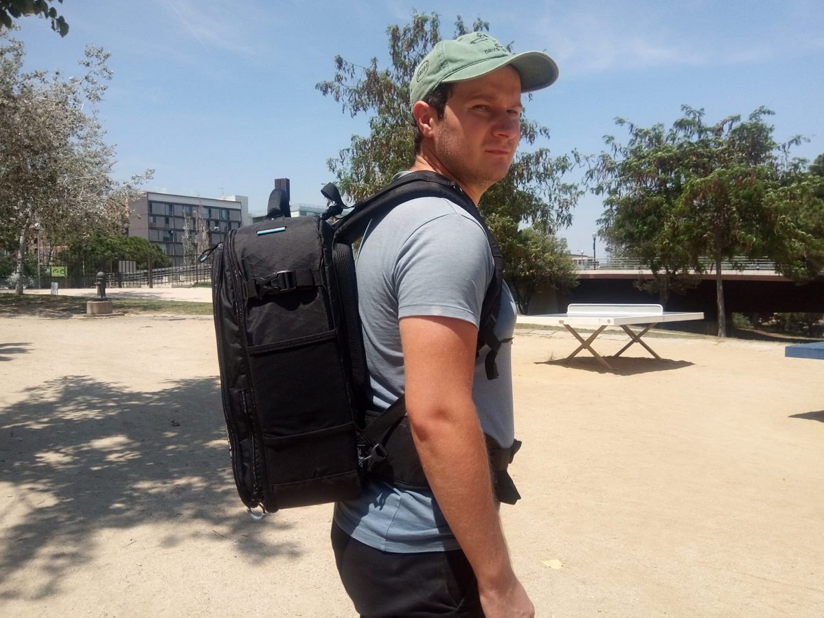 Photographer wearing the Guru Gear Kiboko V2.0 22L backpack