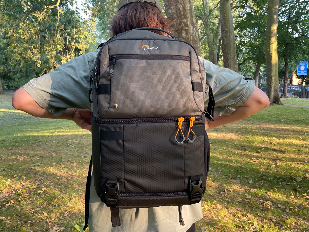 The back of the Lowepro Fastpack Pro BP 250 AW III being worn outside