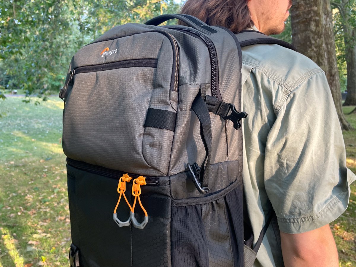 Lowepro Fastpack top back detail with it being worn by a person