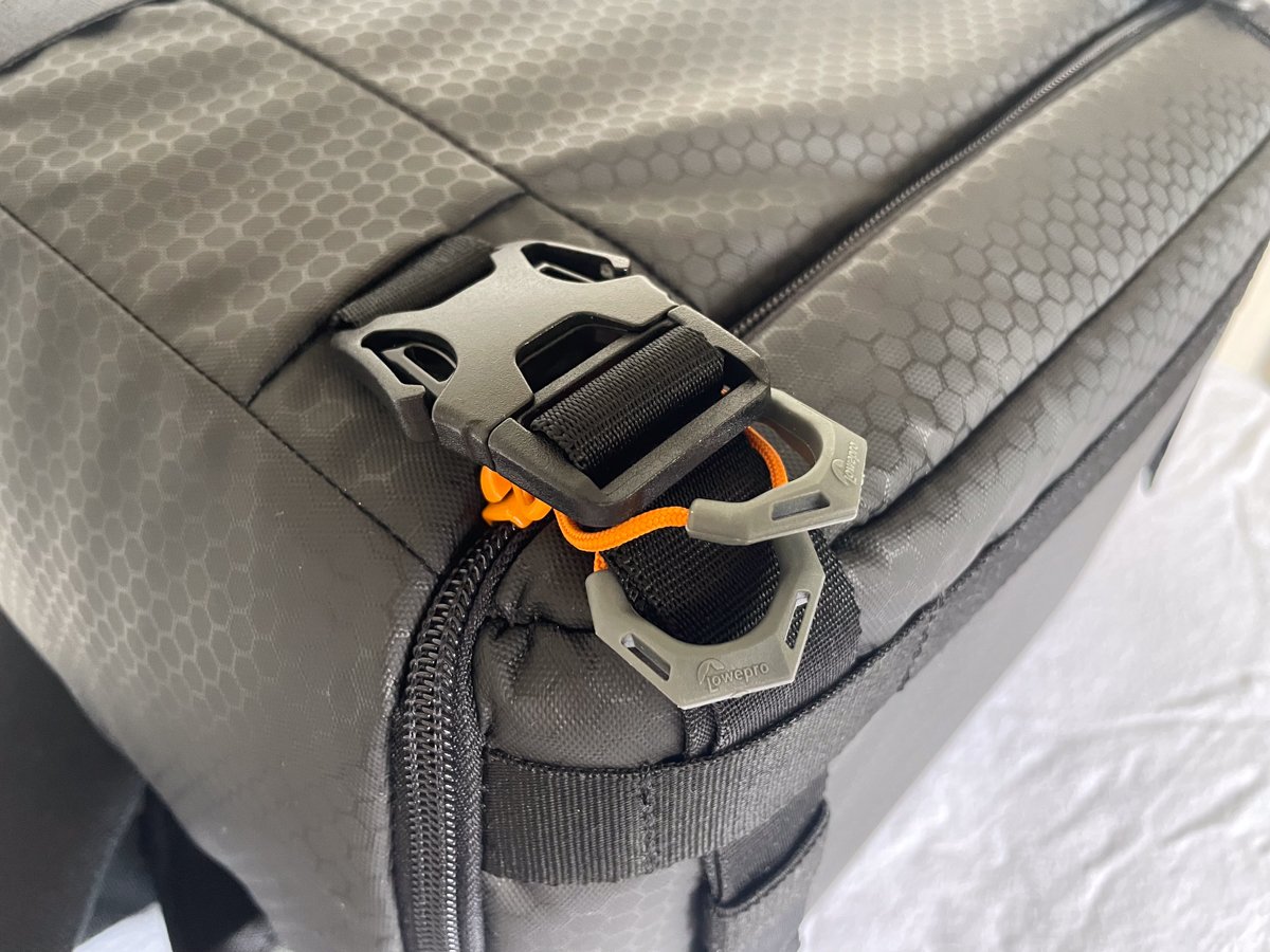 Lowepro FastPack security detail of U-shaped zipper pulls and the bottom clips