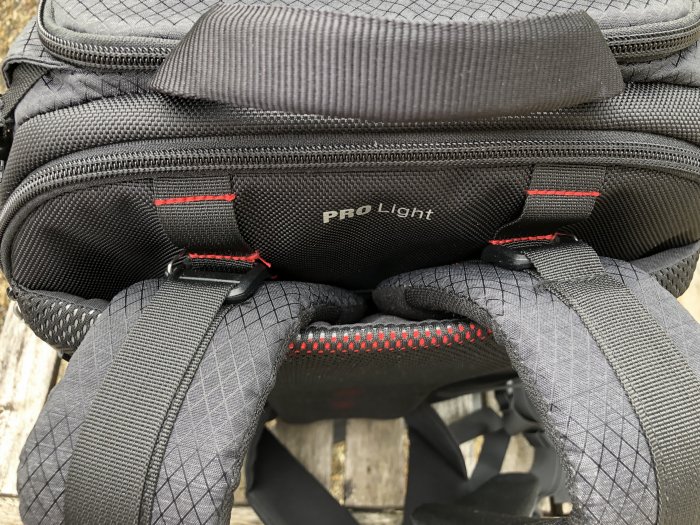 The shoulder strap attachment points of the Manfrotto PRO Light Multiloader camera backpack