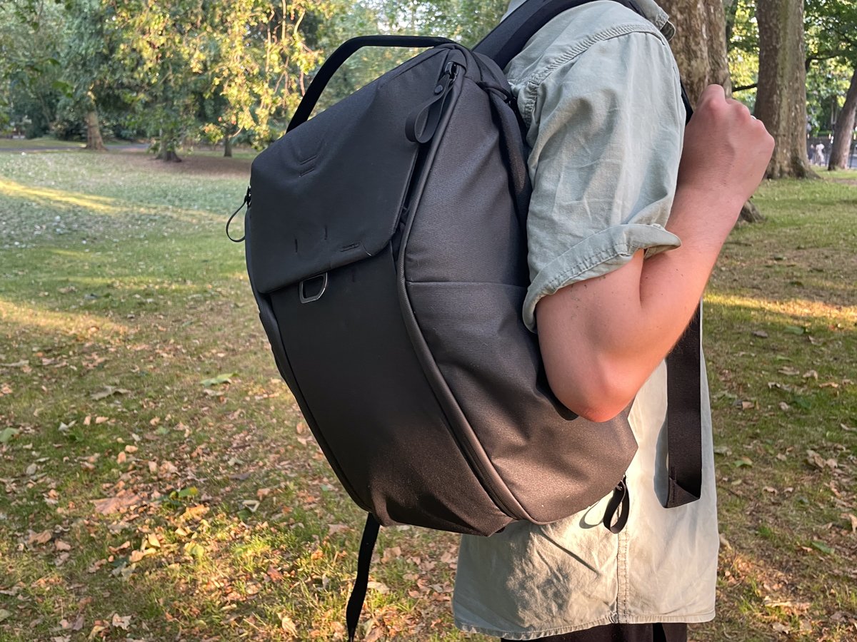 Peak Design Everyday Backpack being worn over the shoulder outside