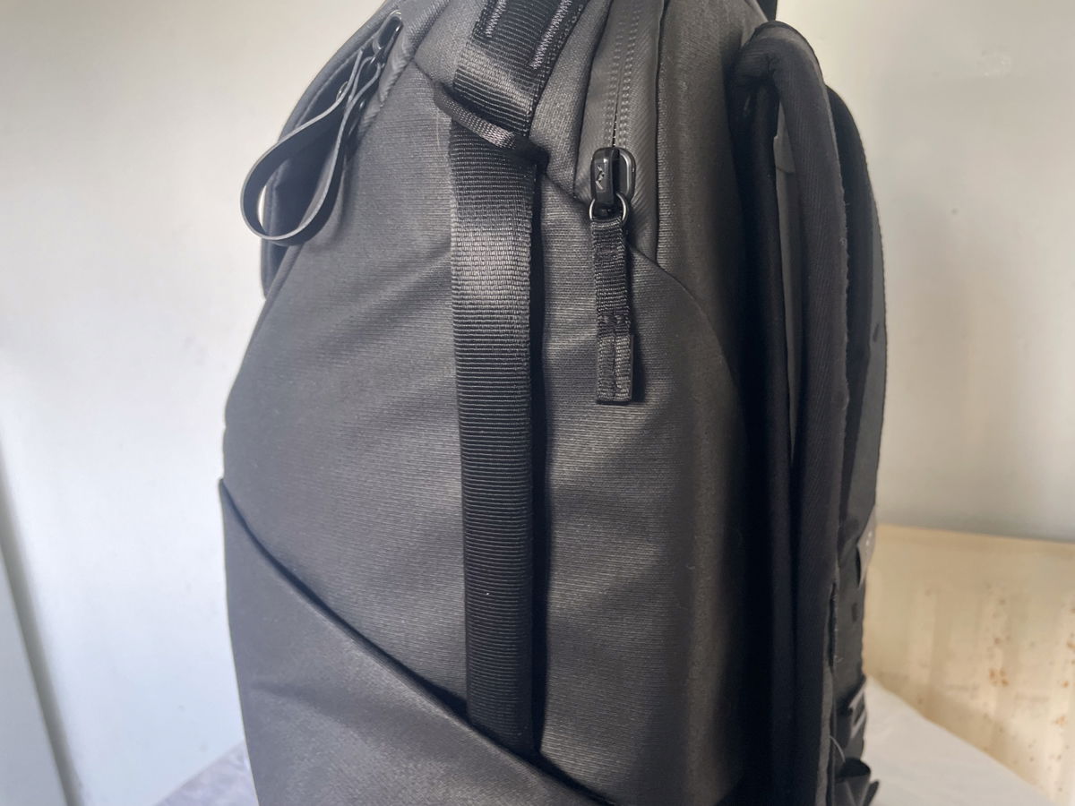 Backpack with side online handle