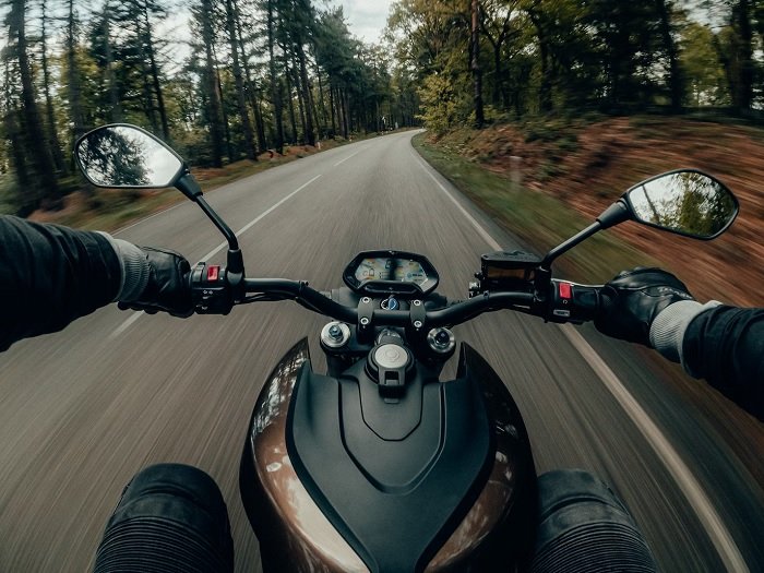 Helmet camera image of a biker riding a motorbike