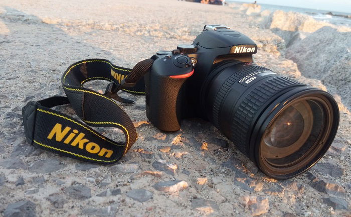 Nikon D3500 on a concrete pier during the golden hour