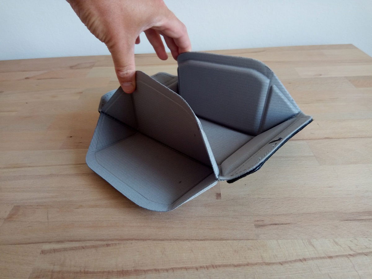 Divider being folded