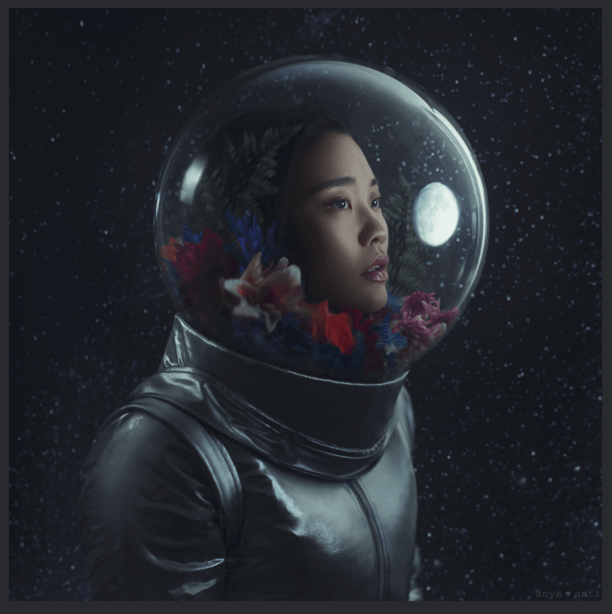Astronaut portrait with flowers in her helmet