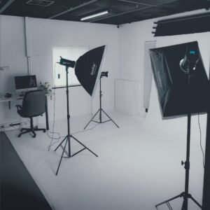 Photography studio with three light stands mounted with lights