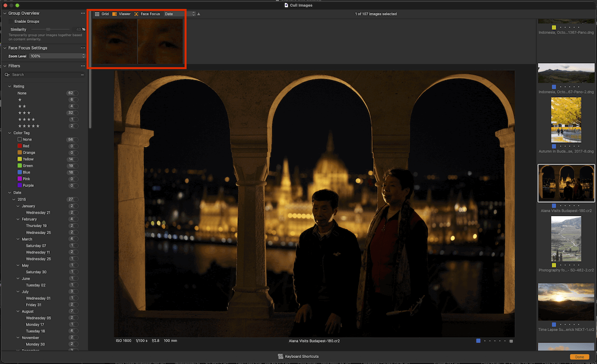 Screenshot of face focus areas highlighted in Culling view in a low-light scene of people standing under arches