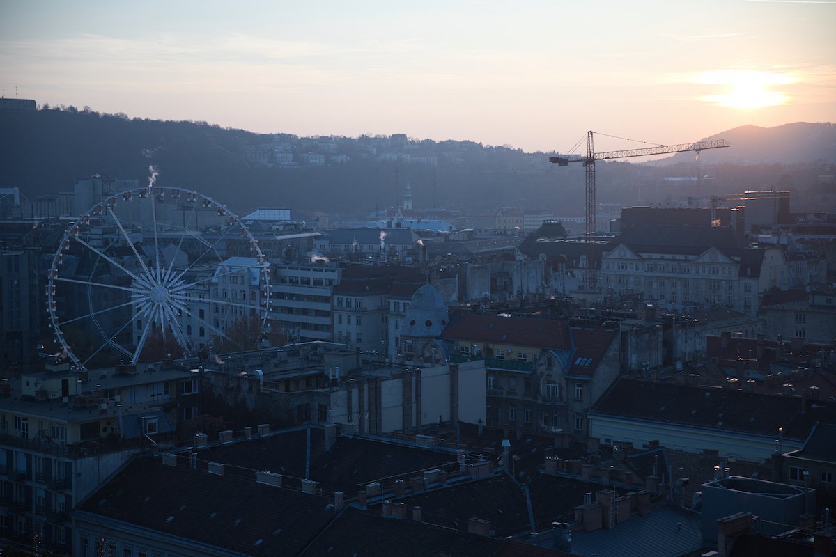 RAW image of cityscape with Ferris wheel