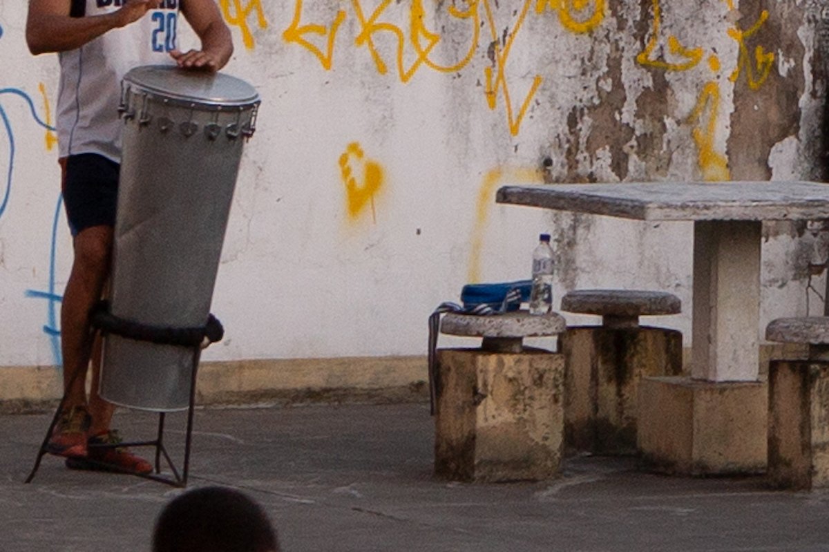Cropped Lightroom image with person playing steel drums