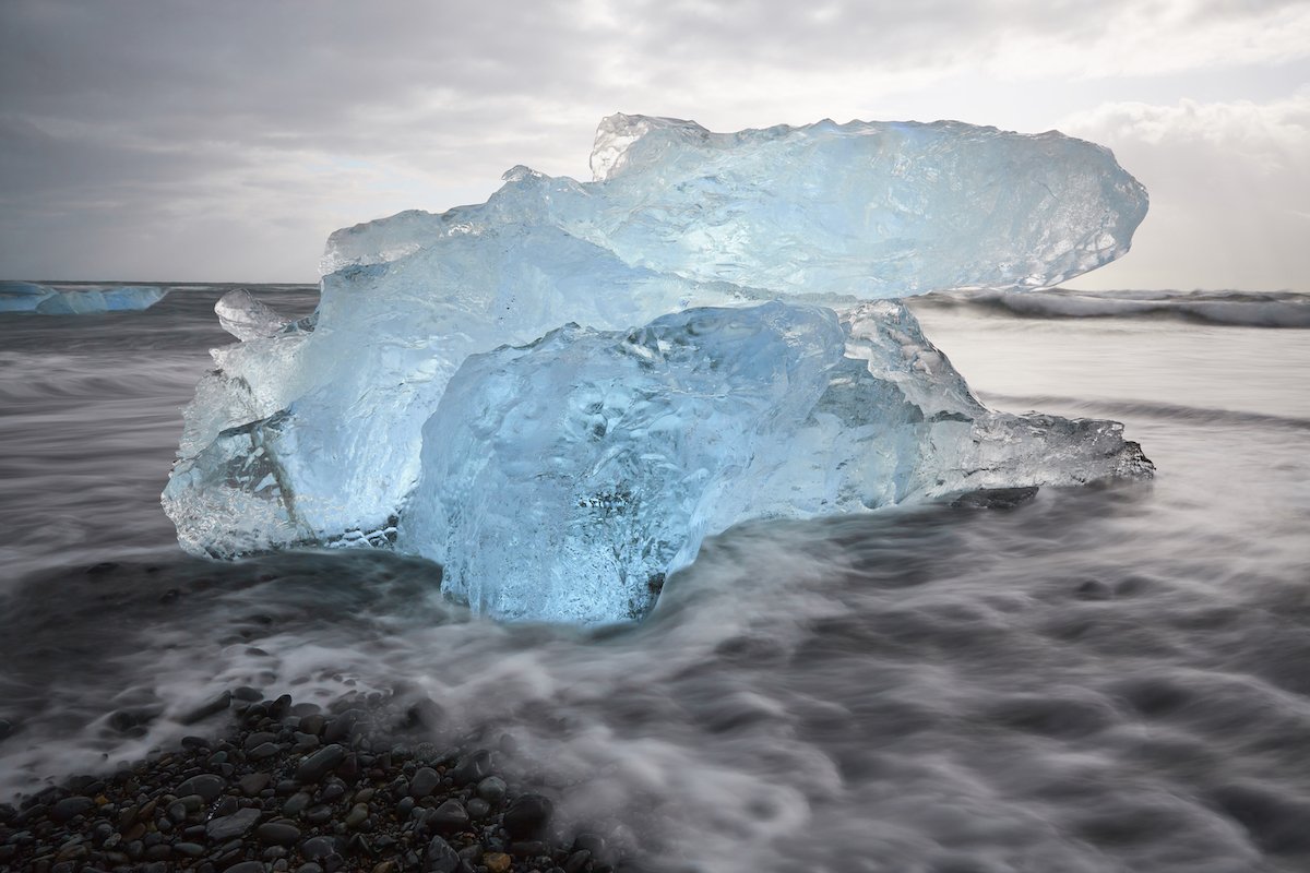 Long-exposure image of an ice floe washed ashore edited with Capture One