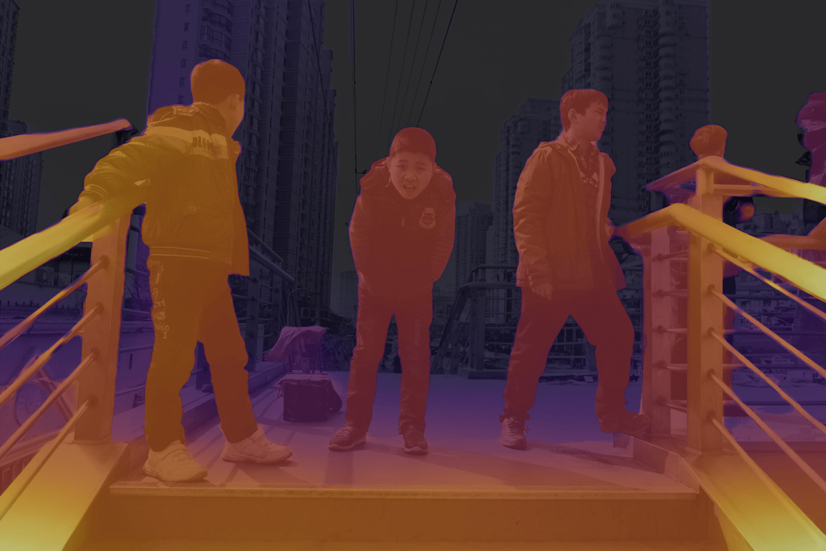 Image of boys on a city platform with a depth heat map applied in Adobe Lightroom