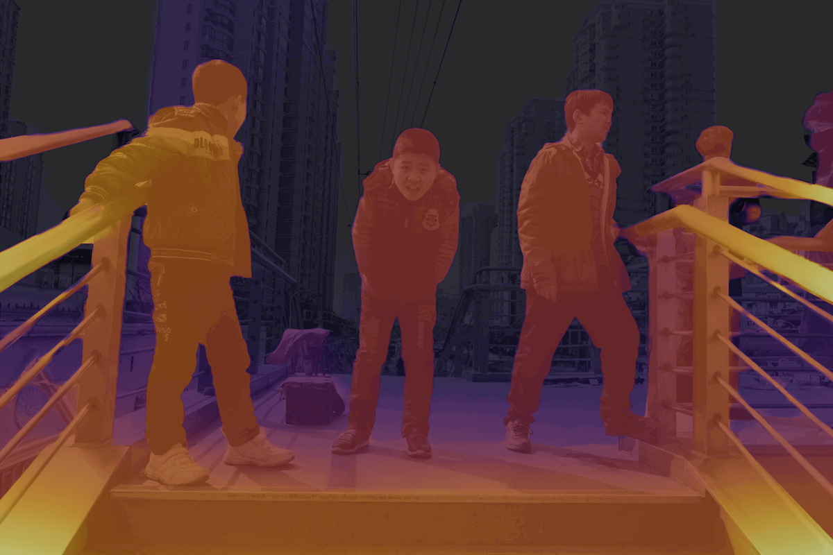 Image of boys on a city platform with a depth heat map applied in Adobe Lightroom