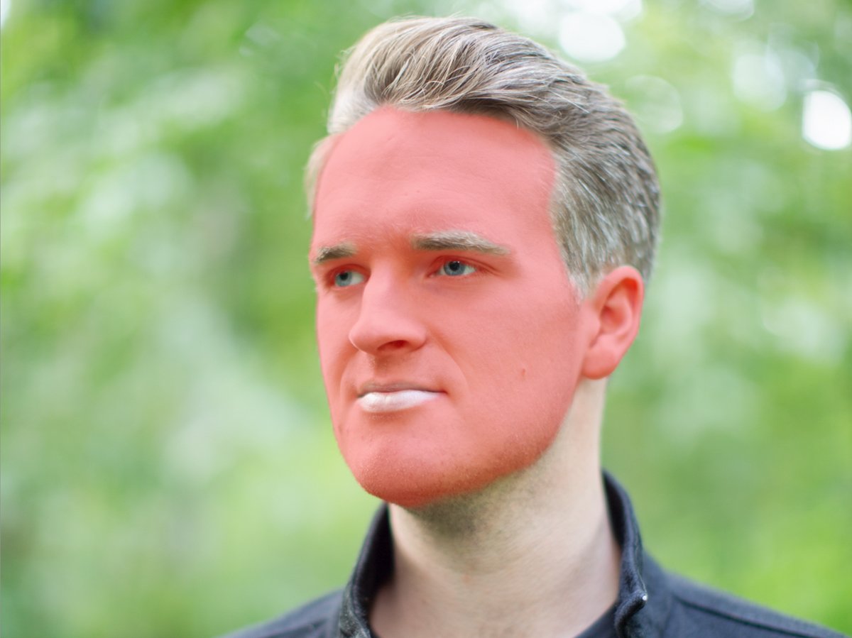 A facial skin mask applied to a portrait