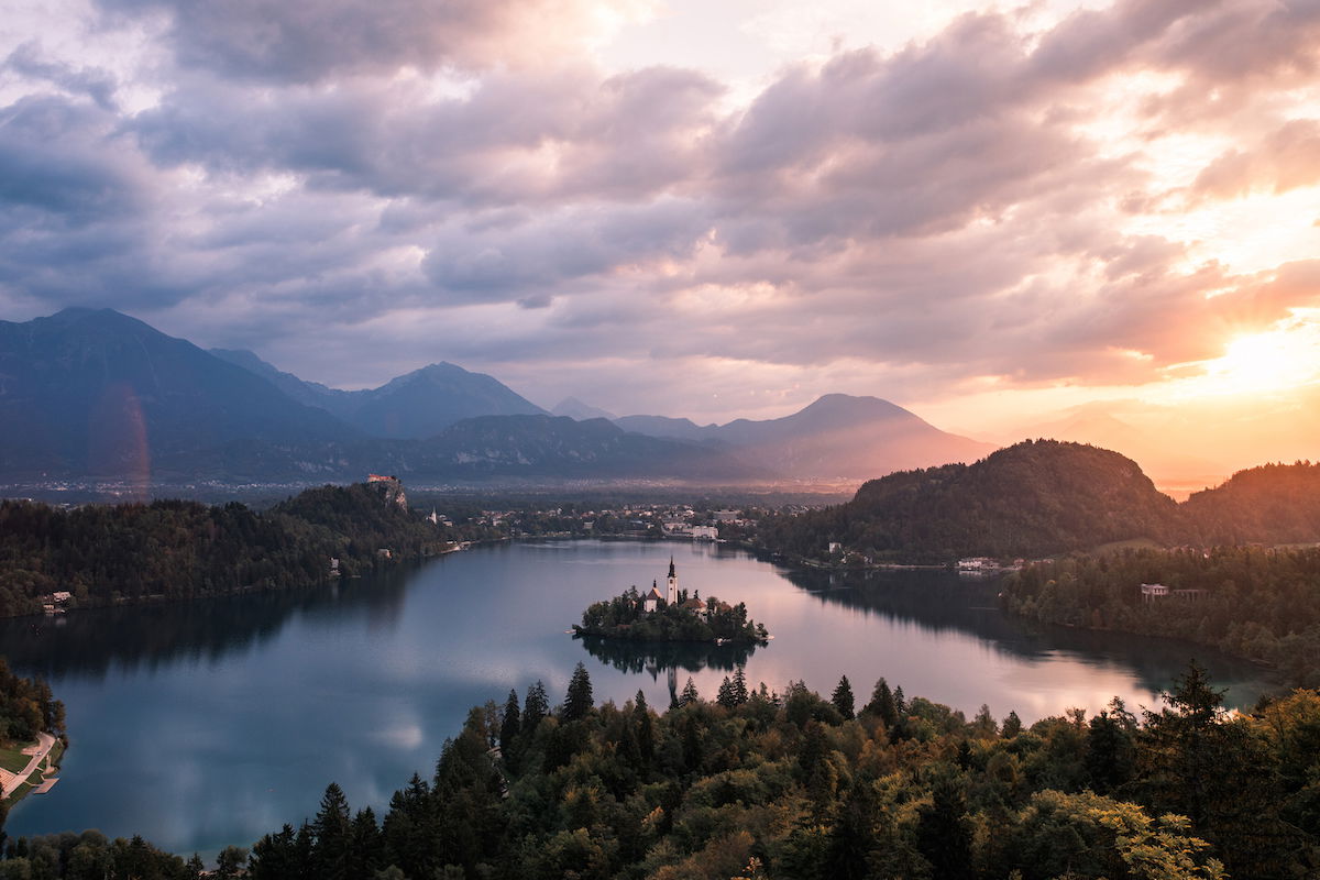 Travel landscape image with mountains, a lake, and trees edited in Adobe Lightroom