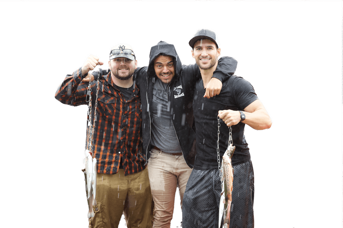 photograph of three men in the rain after a fishing trip with the background cut out on inPixio