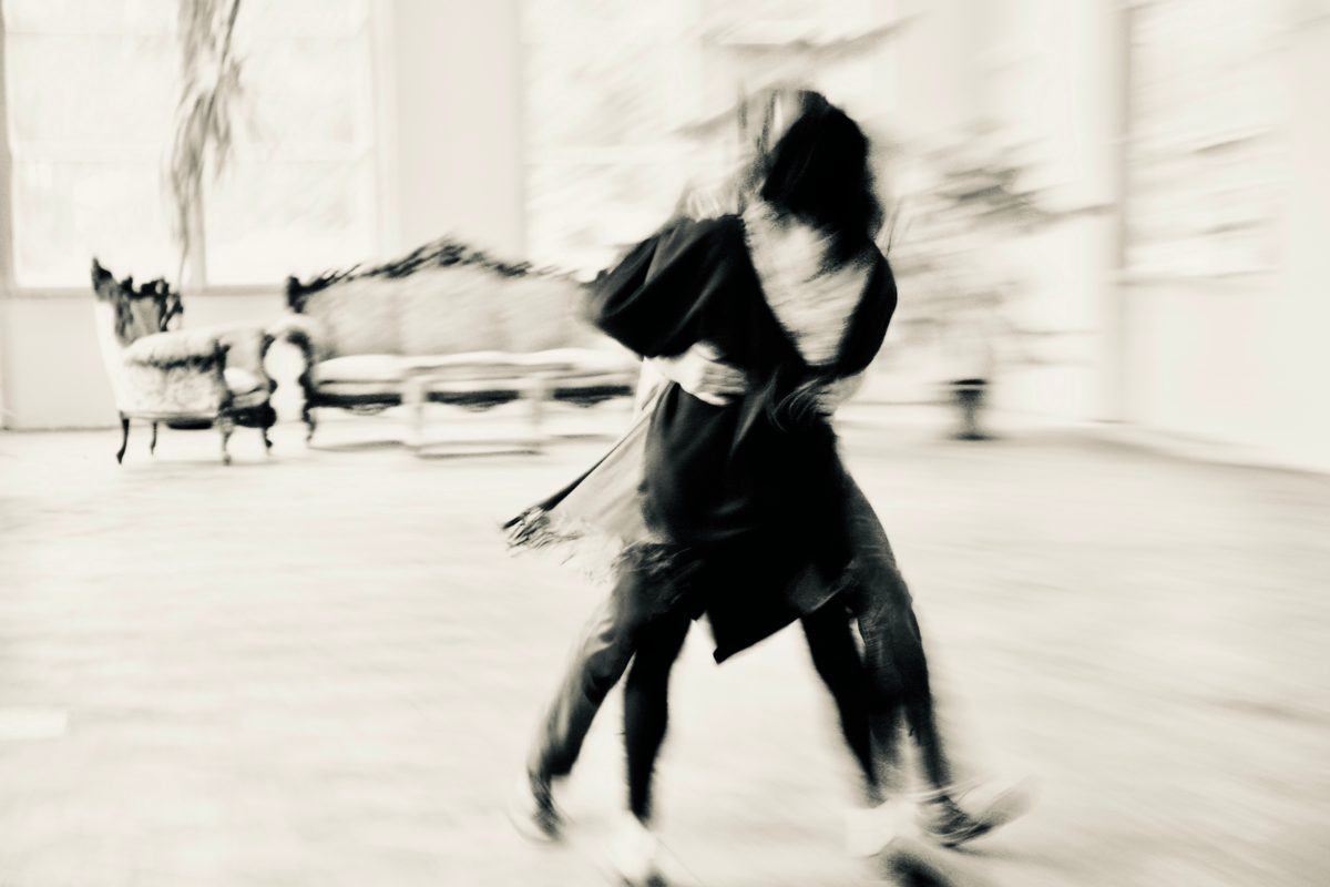 A stylised blurred photo of a couple dancing