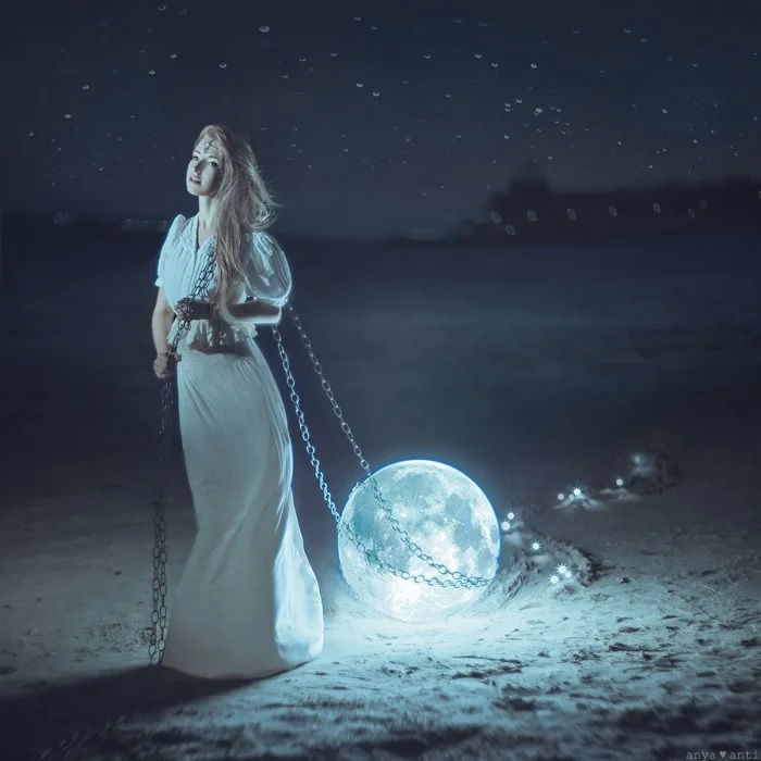 Portrait of a woman in a white dress dragging the moon behind her