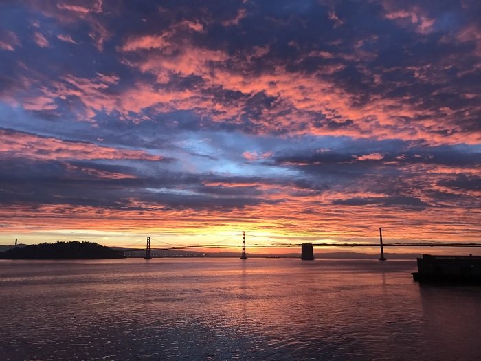 Sunset image with colorful clouds over the San Francisco bay