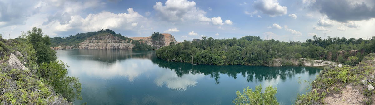 HDR panorama of a lake with trees around it to show how to merge photos in LIghtroom