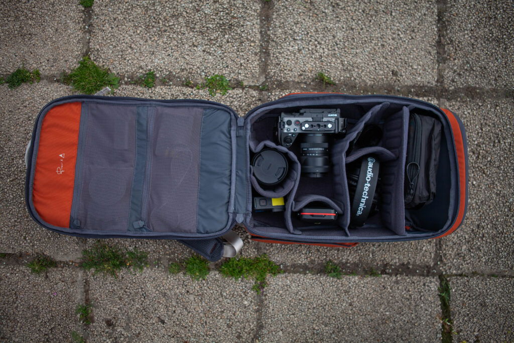 Nomatic Luma Camera Pack opened up, showing inside padding and dividers