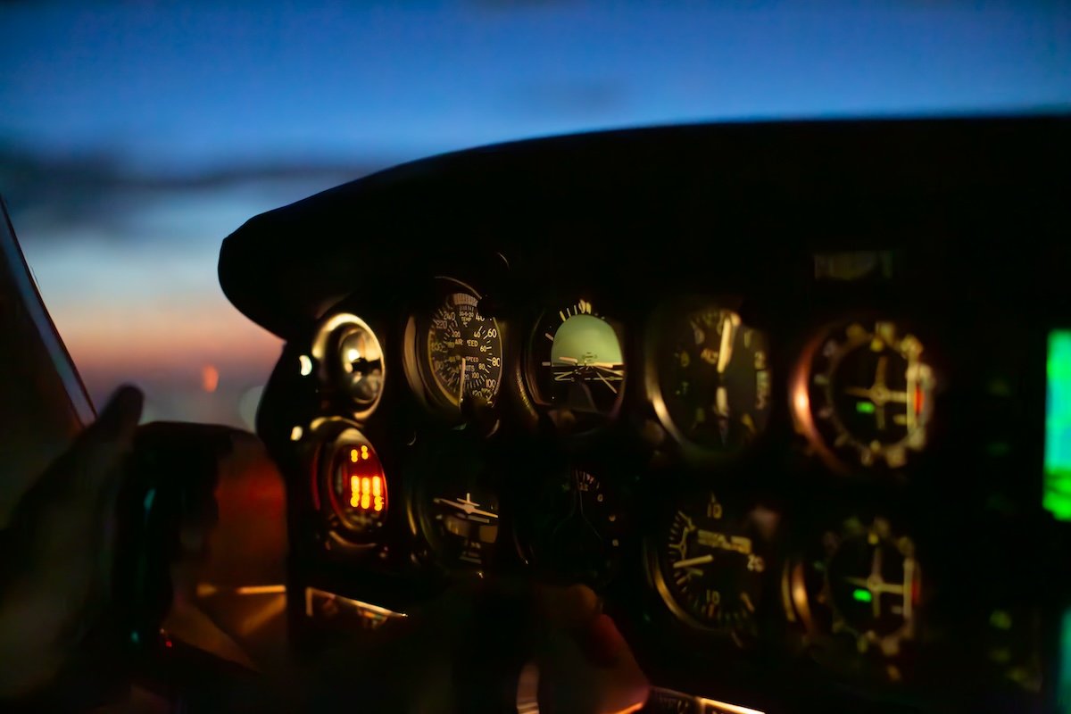 Photograph of a cockpit at night 
