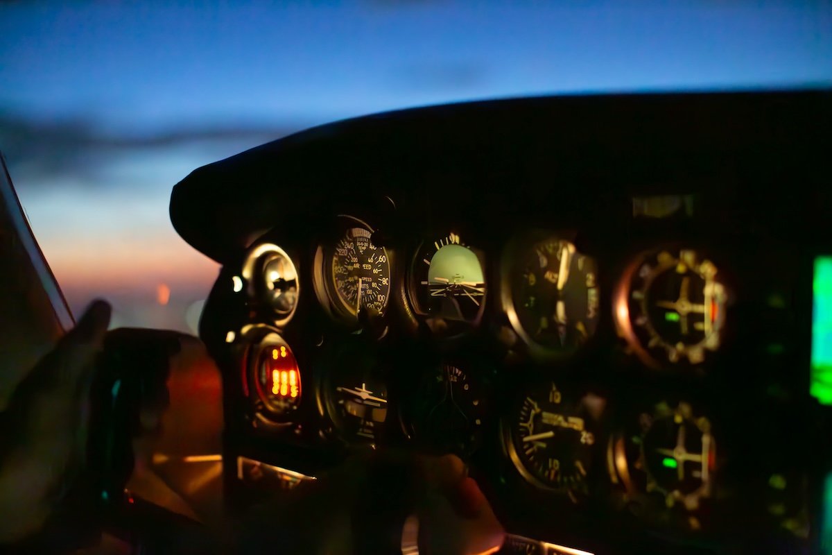 photo of a cockpit at night