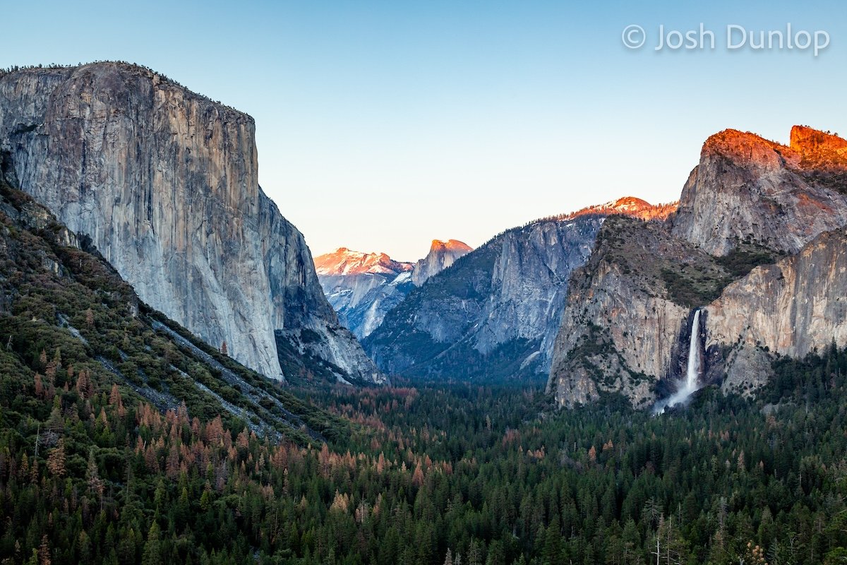 Photo of mountains in Yosemite with watermark in top right